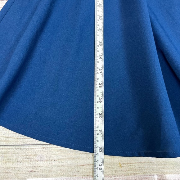 Urban Outfitters Kimchi Blue Navy Front Tie
Keyhole Skater Dress Size 6 - Picture 13 of 13